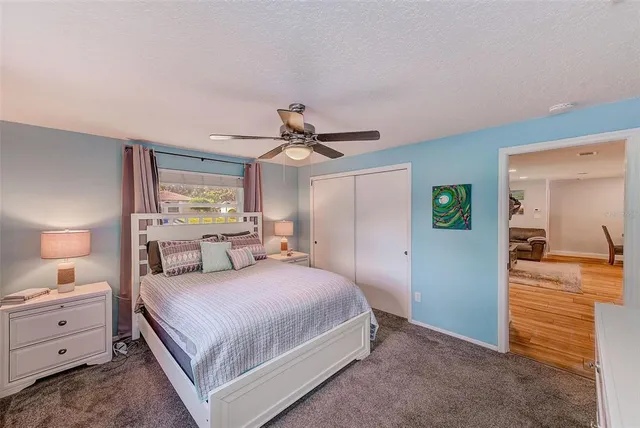 a view of a patio with a table and chairs