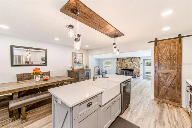 a view of a room with window and furniture