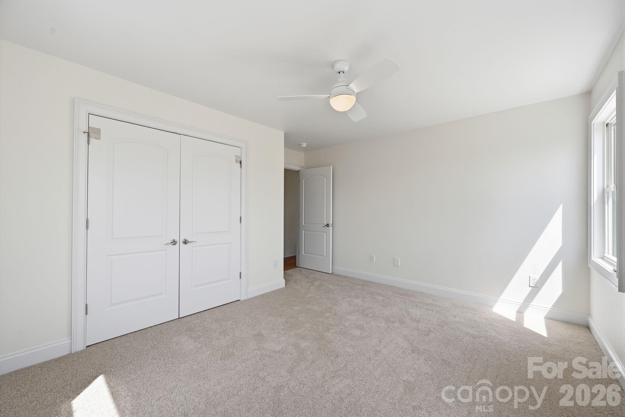 166 Ridge Run Drive Statesville, NC 28625 - Photo 13 of 19 a view of an empty room and a window