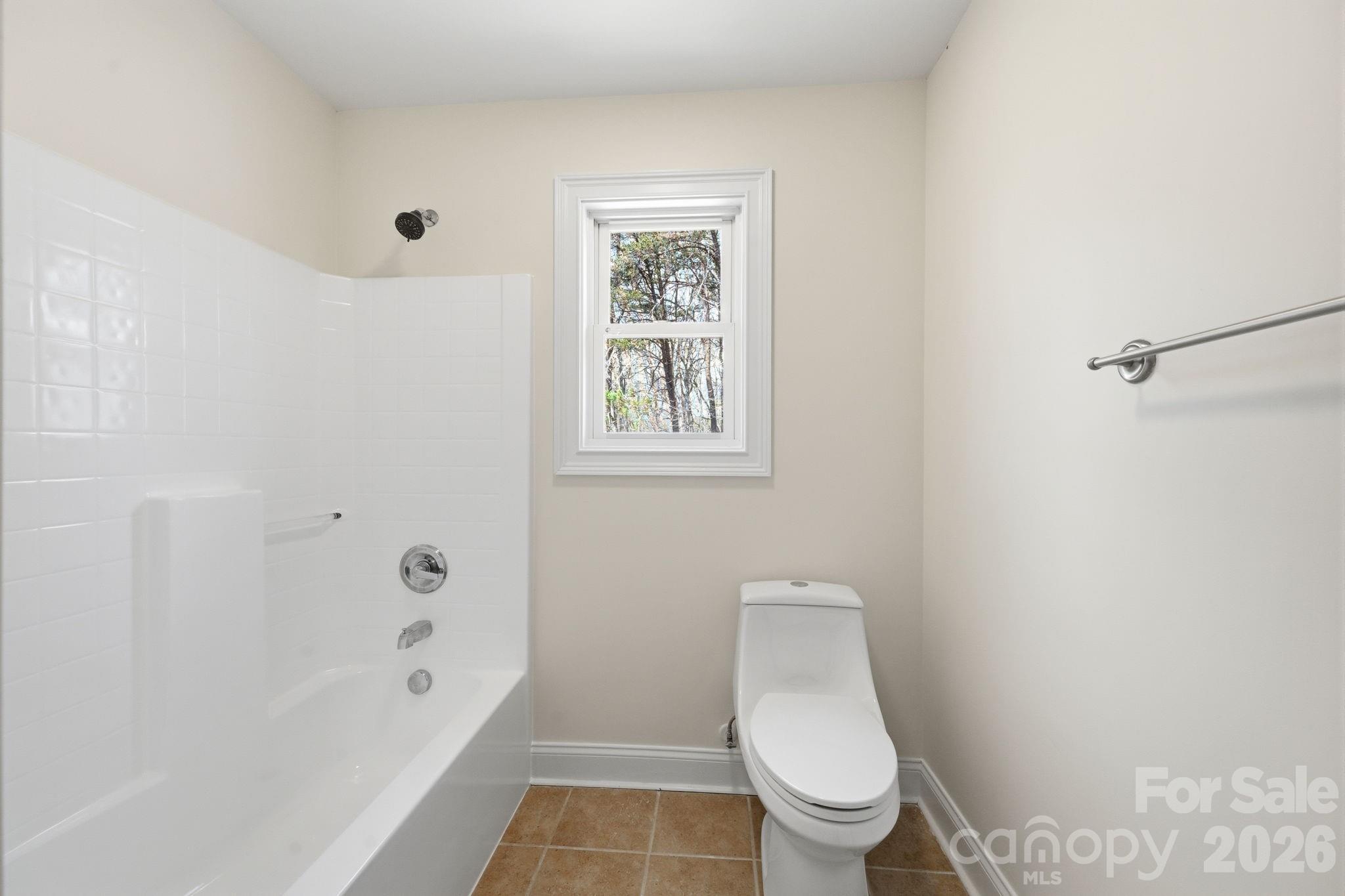 166 Ridge Run Drive Statesville, NC 28625 - Photo 15 of 19 a bathroom with a toilet a sink and bathtub