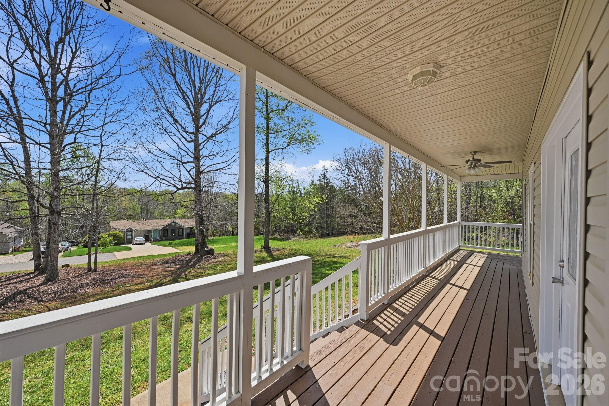 166 Ridge Run Drive Statesville, NC 28625 - Photo 2 of 19 a view of balcony with wooden floor and fence