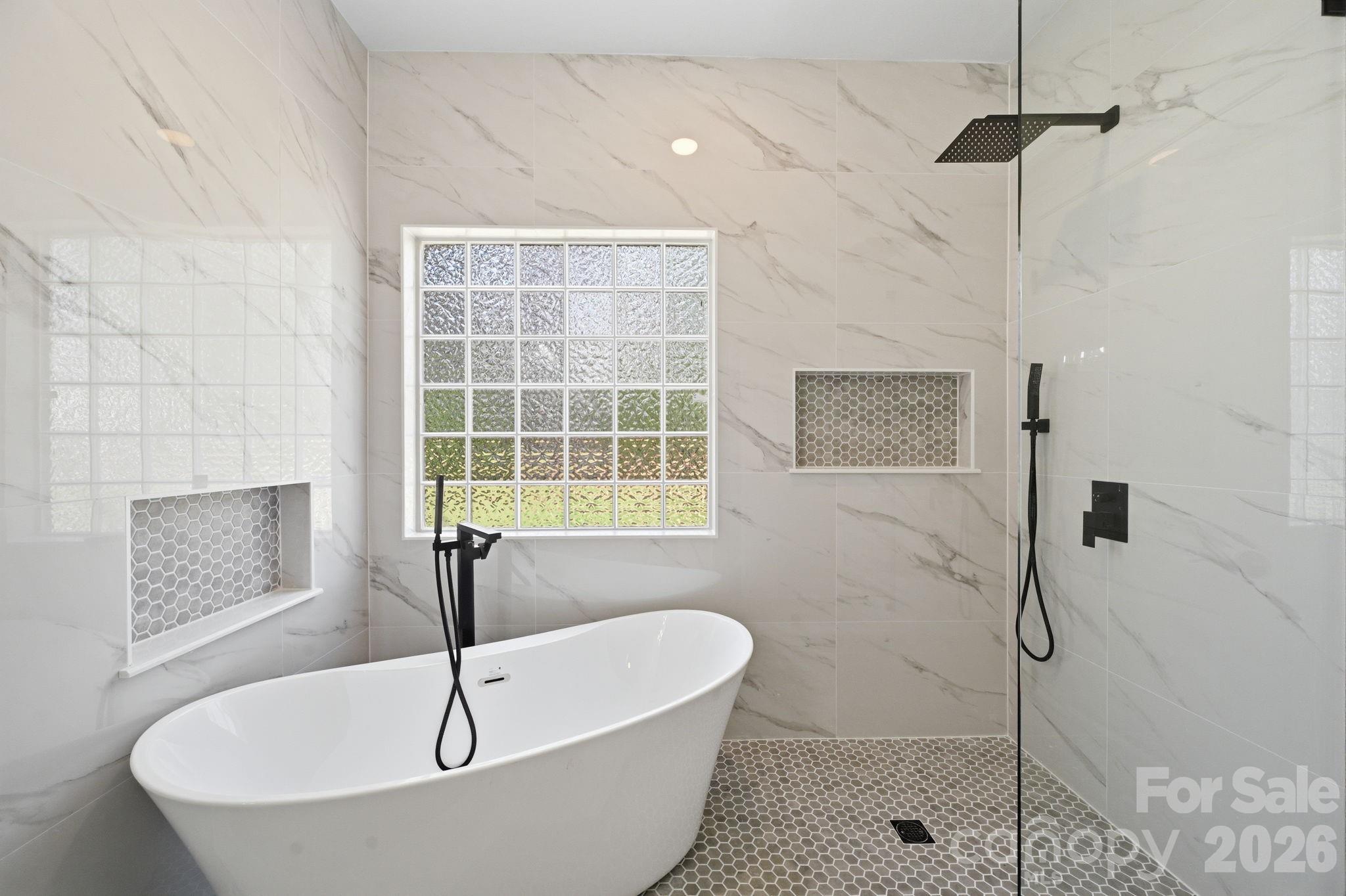 166 Ridge Run Drive Statesville, NC 28625 - Photo 9 of 19 a bathroom with a tub and shower