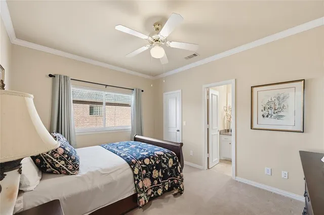 a bathroom with a granite countertop sink a mirror and a shower