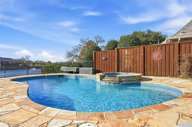 a view of a house with swimming pool