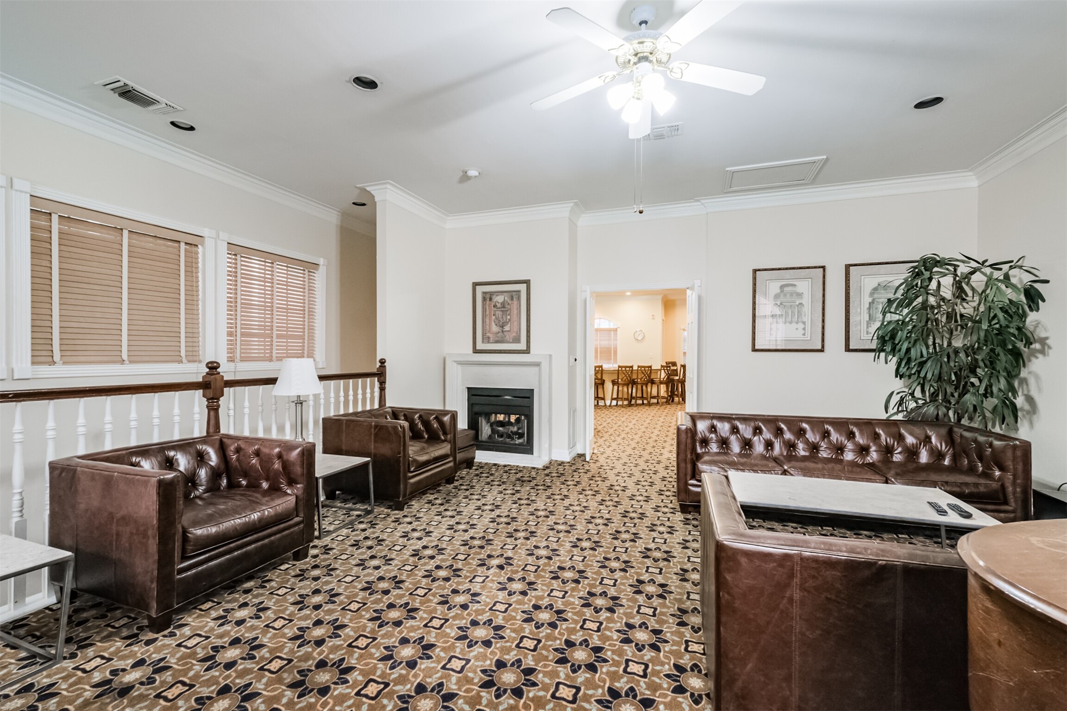 2111 Welch Street, Unit B304 Houston, TX 77019 - Photo 31 of 37 a living room with furniture and a chandelier