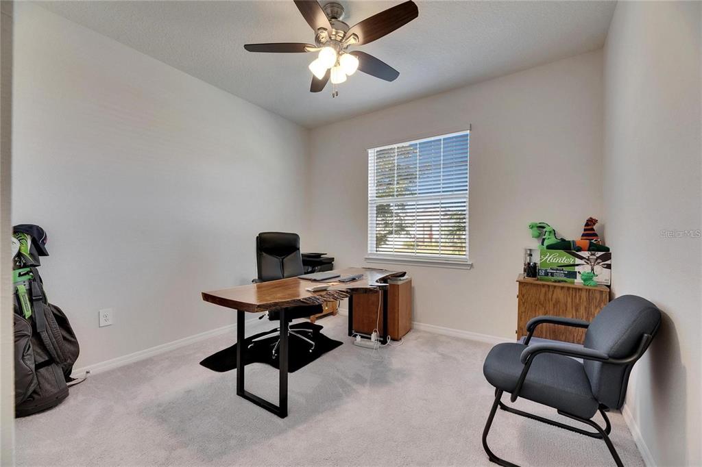5125 Tannin Lane Lakewood Ranch, FL 34211 - Photo 29 of 45 a work room with furniture and windows