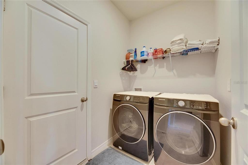 5125 Tannin Lane Lakewood Ranch, FL 34211 - Photo 31 of 45 a utility room with dryer and washer