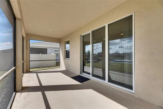 a front view of a house with a large window