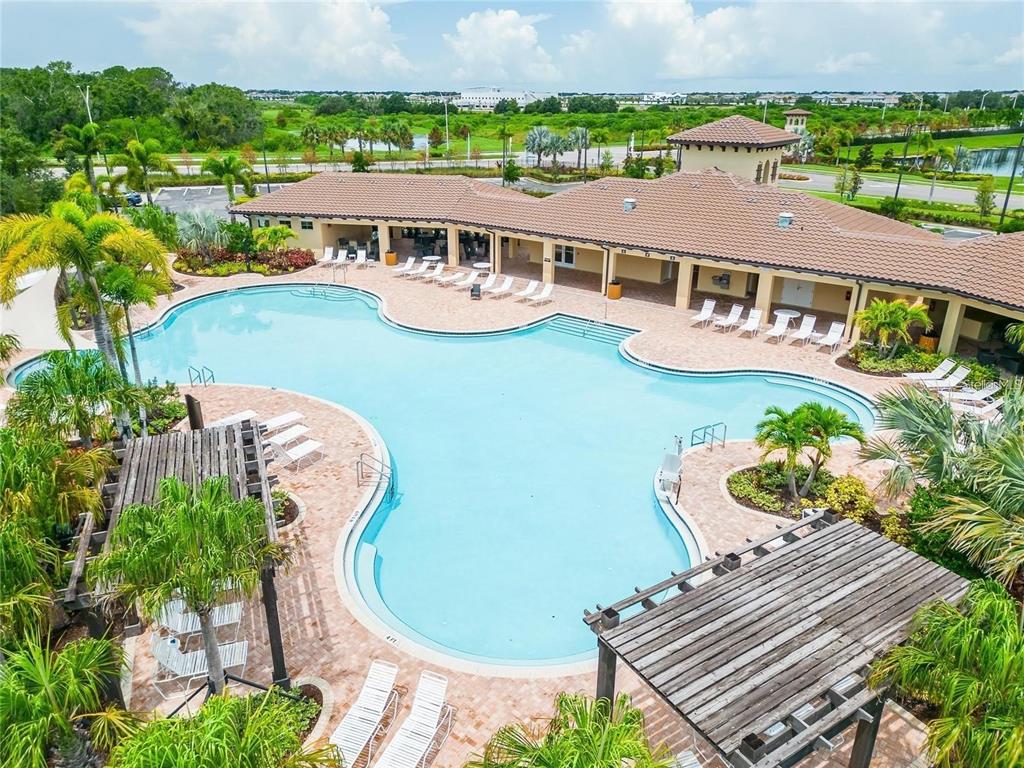 5125 Tannin Lane Lakewood Ranch, FL 34211 - Photo 40 of 45 an aerial view of a house with outdoor space and a lake view