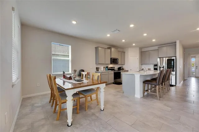 a view of a dining room with furniture