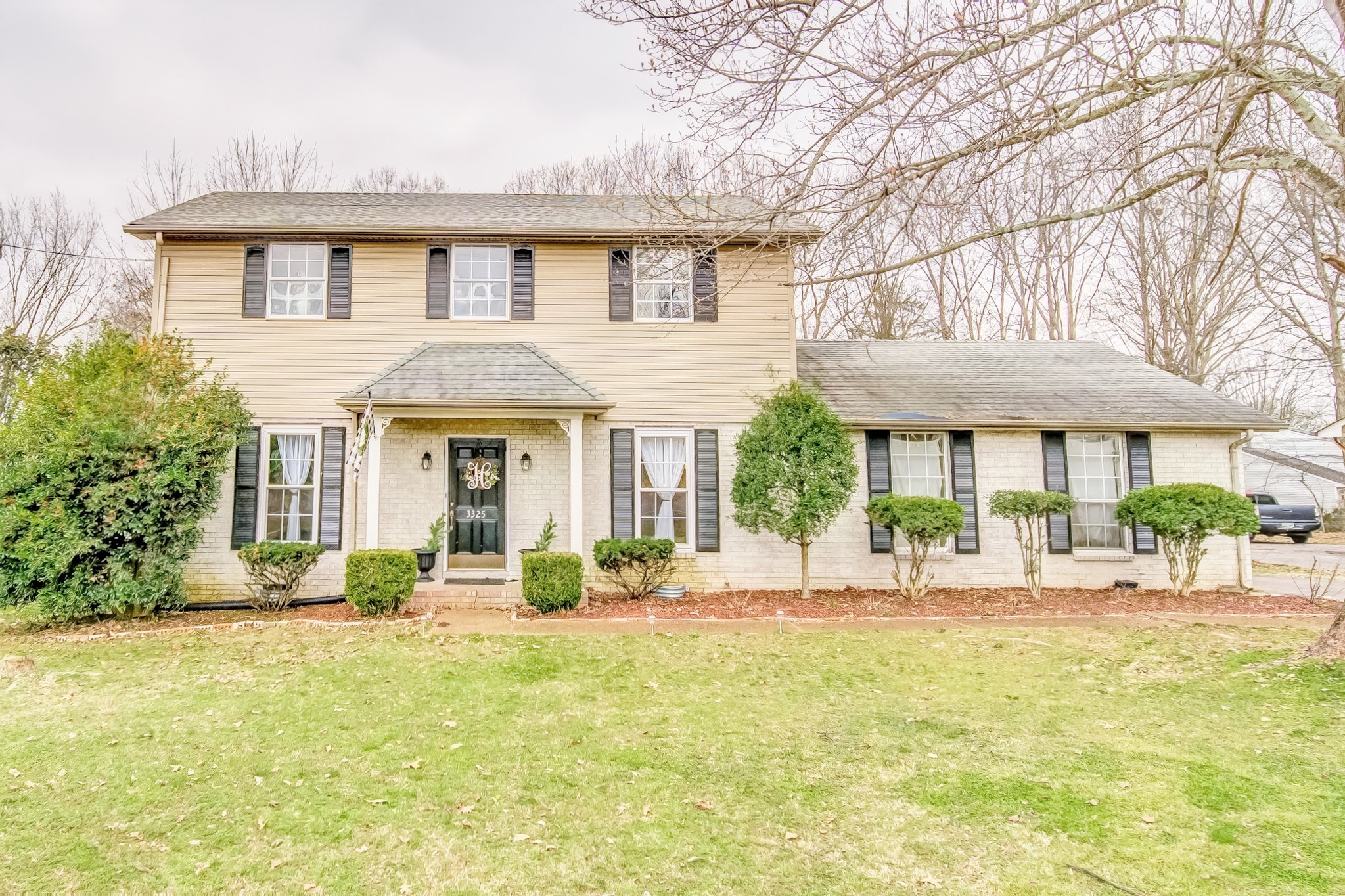 3325 Country Way Road Antioch, TN 37013 - Photo 1 of 37 a front view of a house with garden