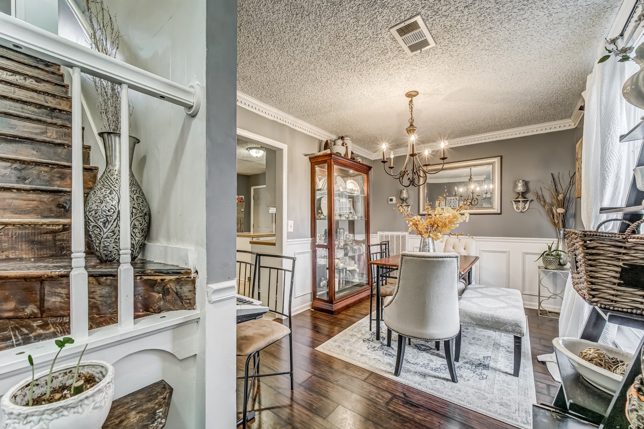 3325 Country Way Road Antioch, TN 37013 - Photo 6 of 37 a view of a dining room with furniture and wooden floor