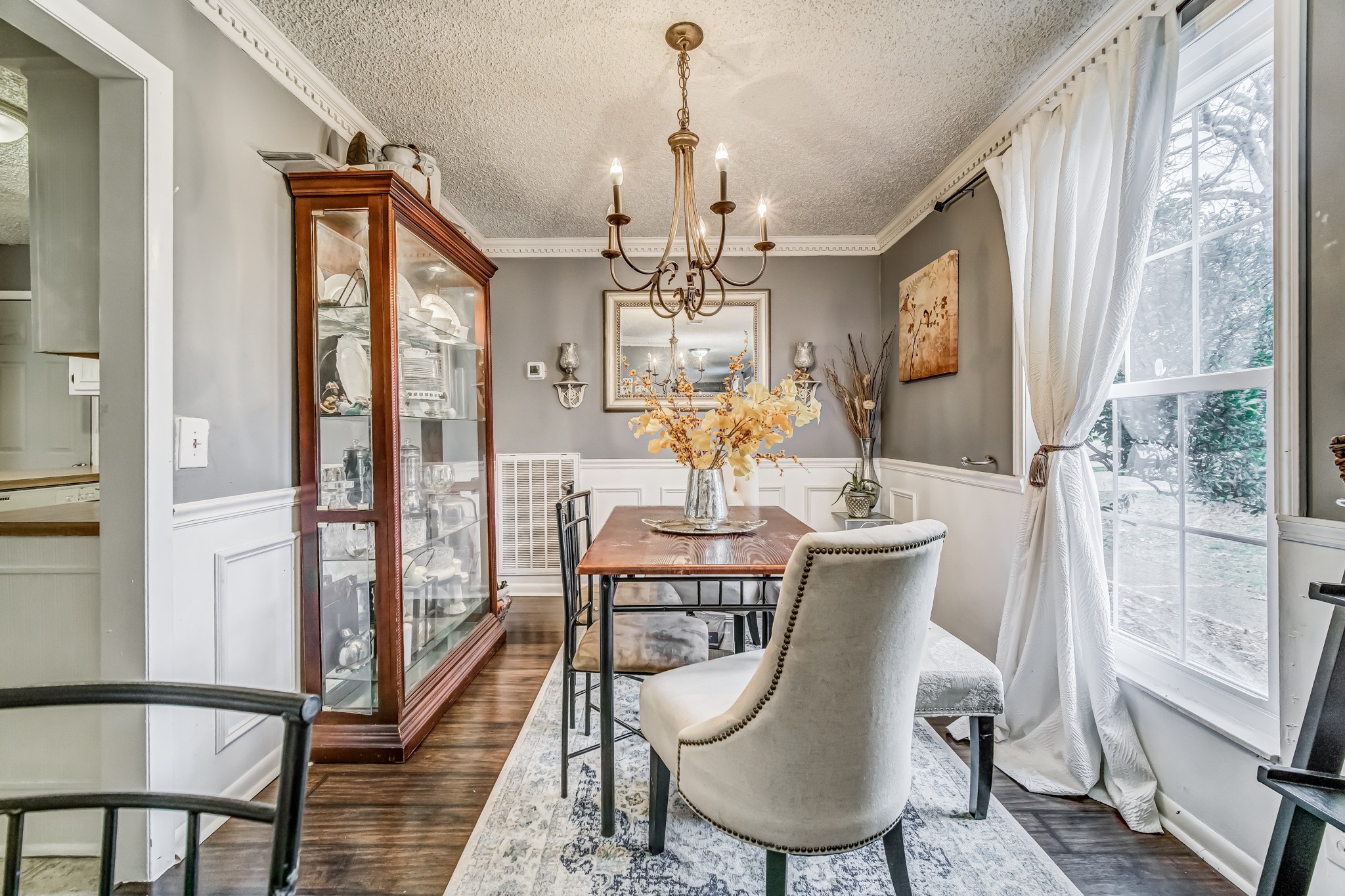3325 Country Way Road Antioch, TN 37013 - Photo 7 of 37 a view of a dining room with furniture wooden floor and chandelier