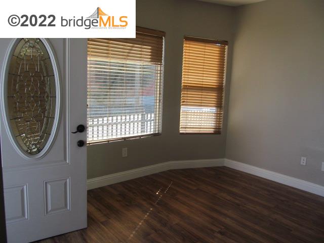 2807 Filbert Street Oakland, CA 94608 - Photo 5 of 29 a view of a hallway with wooden floor and a window