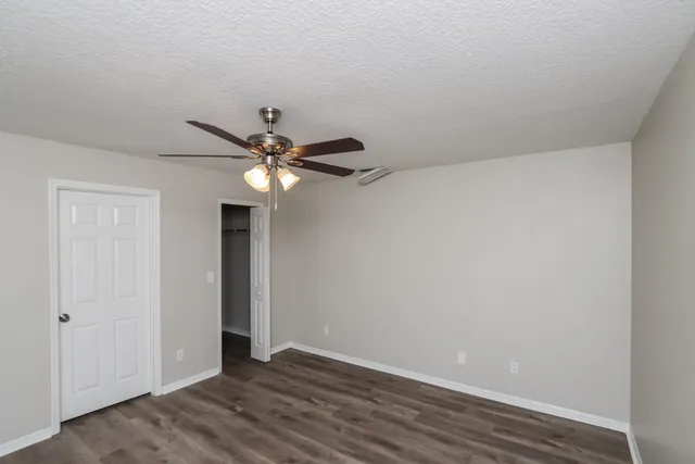 a view of a livingroom with a fan