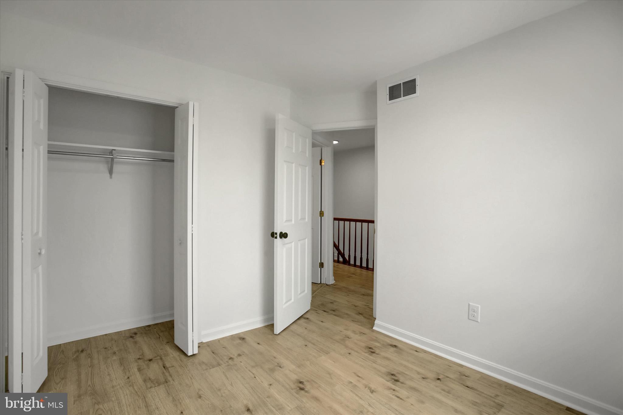1553 Brechbill Road Chambersburg, PA 17202 - Photo 37 of 45 an empty room with wooden floor