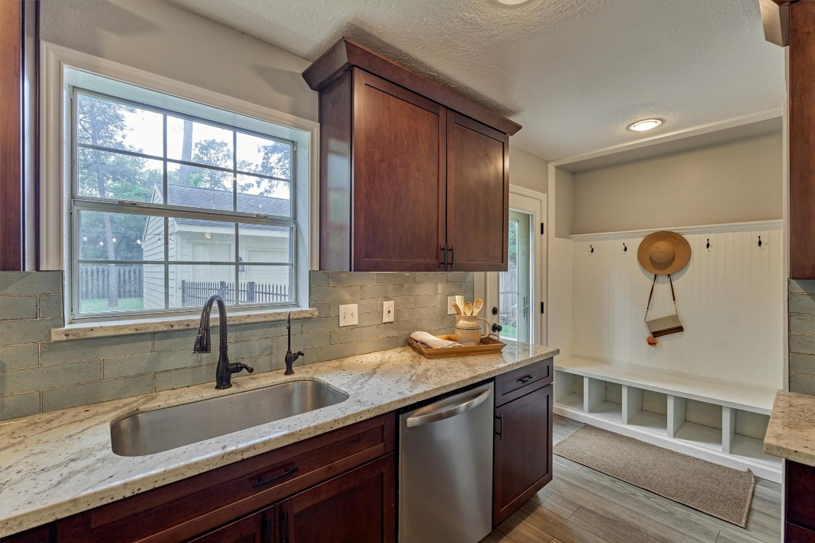 19 Greentwig Place Spring, TX 77381 - Photo 13 of 37 Window over sink that looks out to backyard. Note: water spigot on right of faucet has been replaced with soap dispenser.