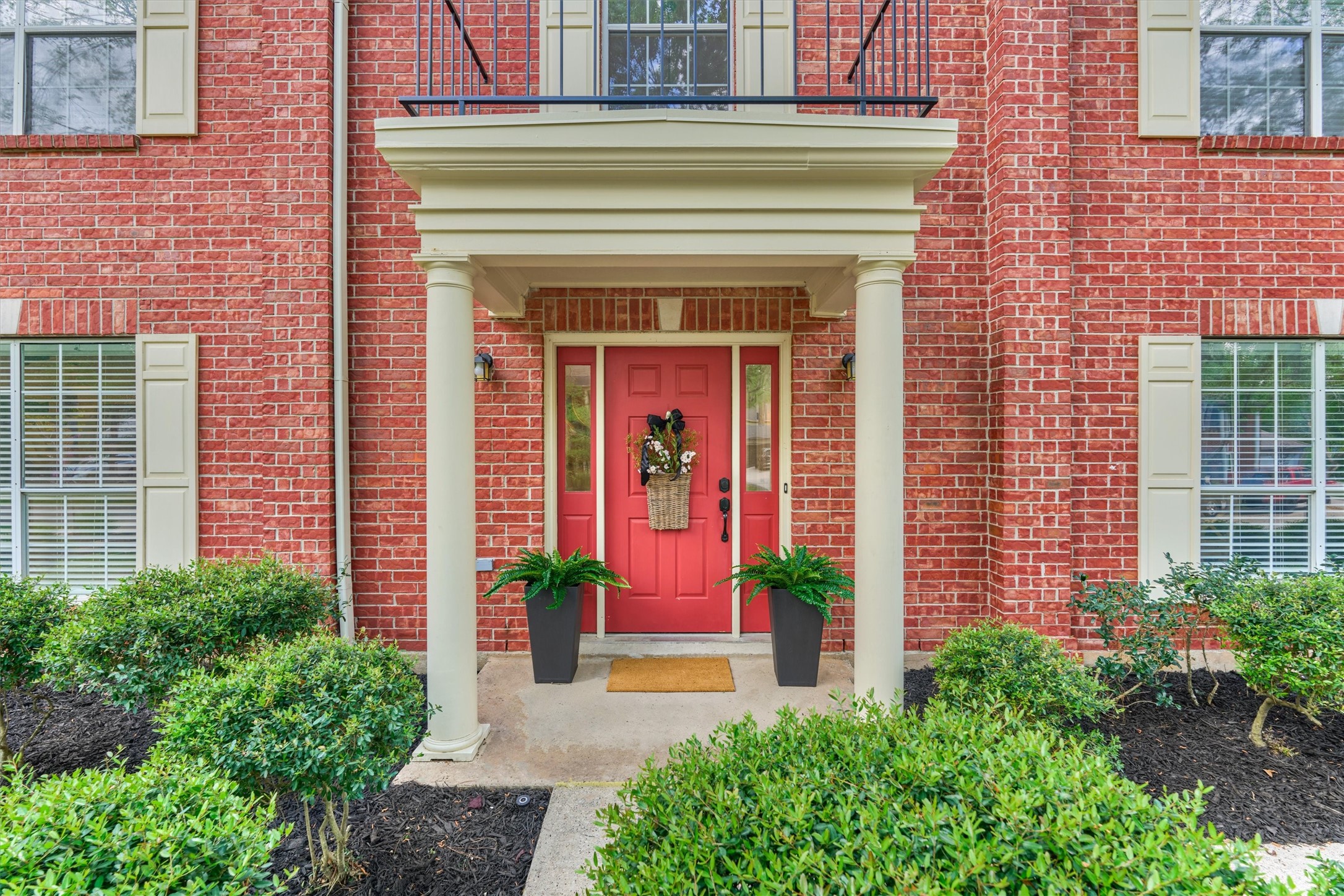 19 Greentwig Place Spring, TX 77381 - Photo 2 of 37 Statement entry with columns, covered porch and balcony.