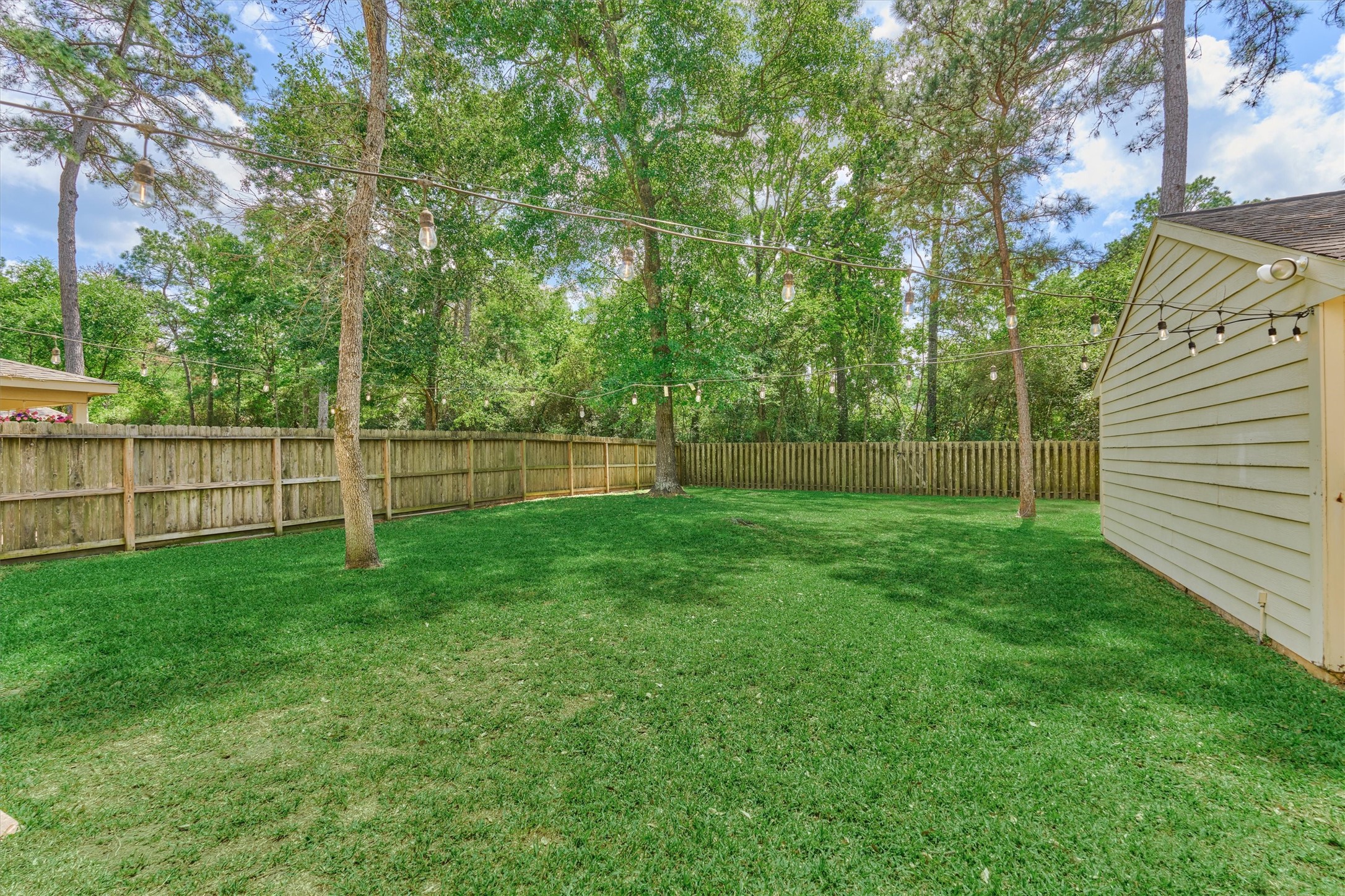 19 Greentwig Place Spring, TX 77381 - Photo 33 of 37 a view of an outdoor space and a yard