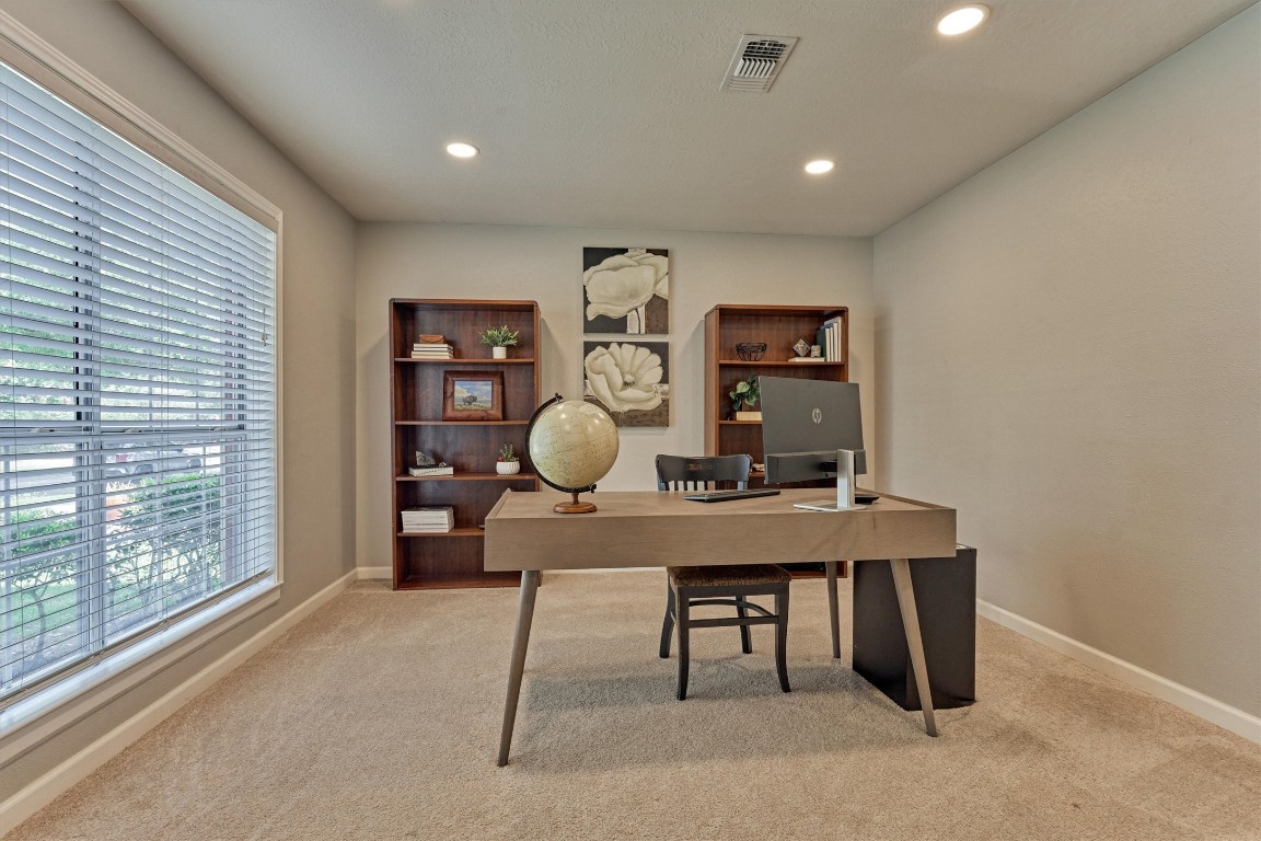 19 Greentwig Place Spring, TX 77381 - Photo 5 of 37 Large home office/study with front facing windows bringing in great natural light.