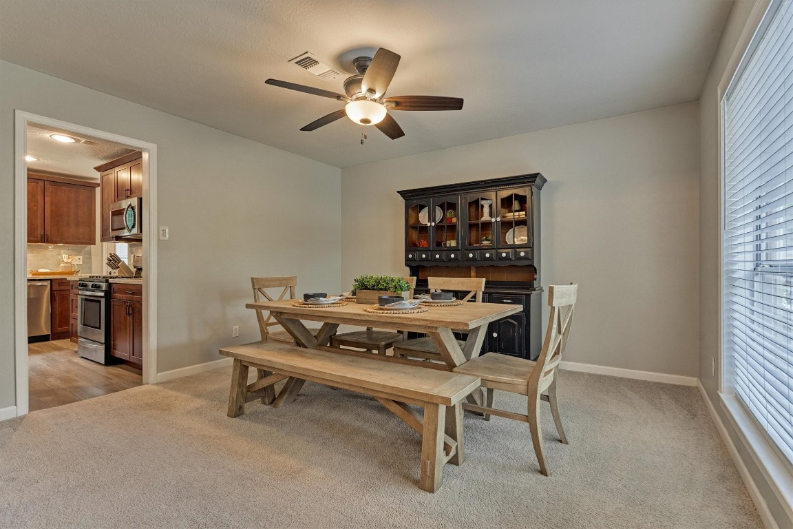 19 Greentwig Place Spring, TX 77381 - Photo 7 of 37 Beautiful Dining Room with front facing windows and cased opening into Kitchen.