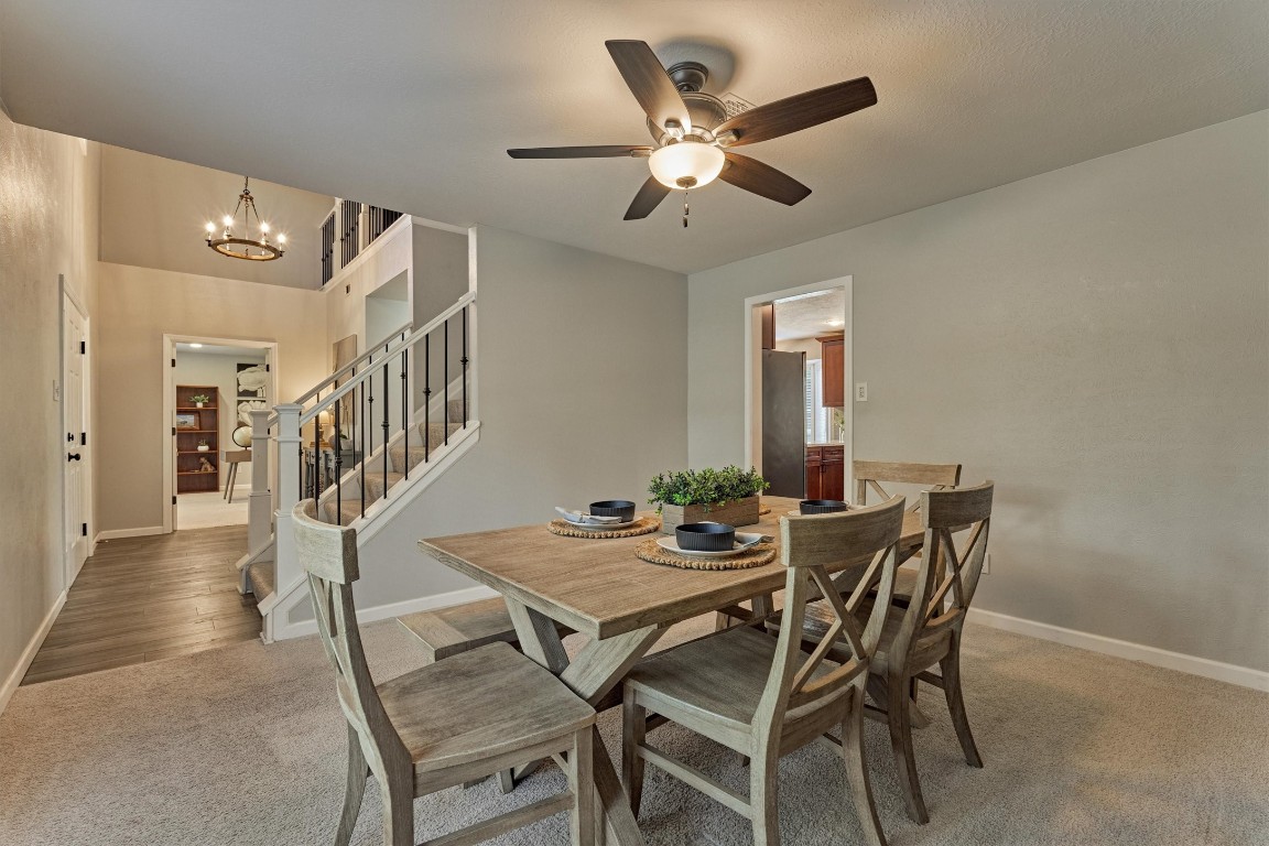 19 Greentwig Place Spring, TX 77381 - Photo 8 of 37 Dining Room can be accessed from kitchen area or from front of home.