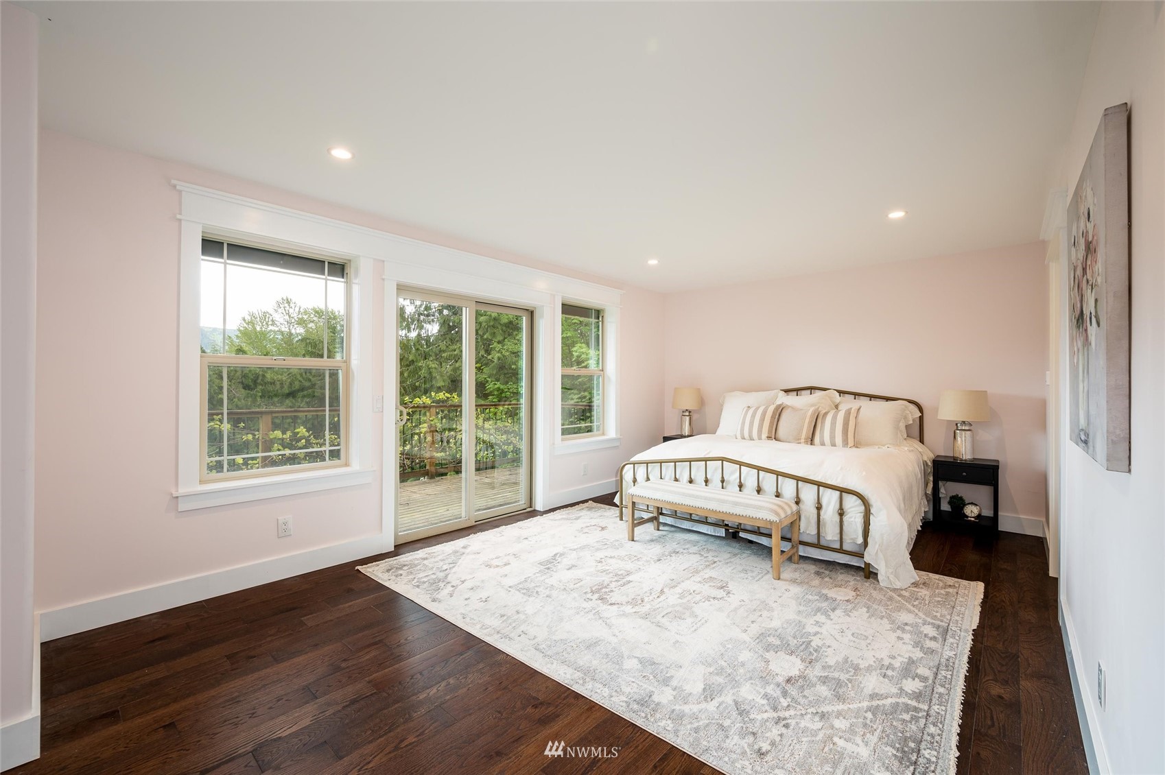 3373 Hillside Road Deming, WA 98244 - Photo 12 of 40 a spacious bedroom with a large bed and a window