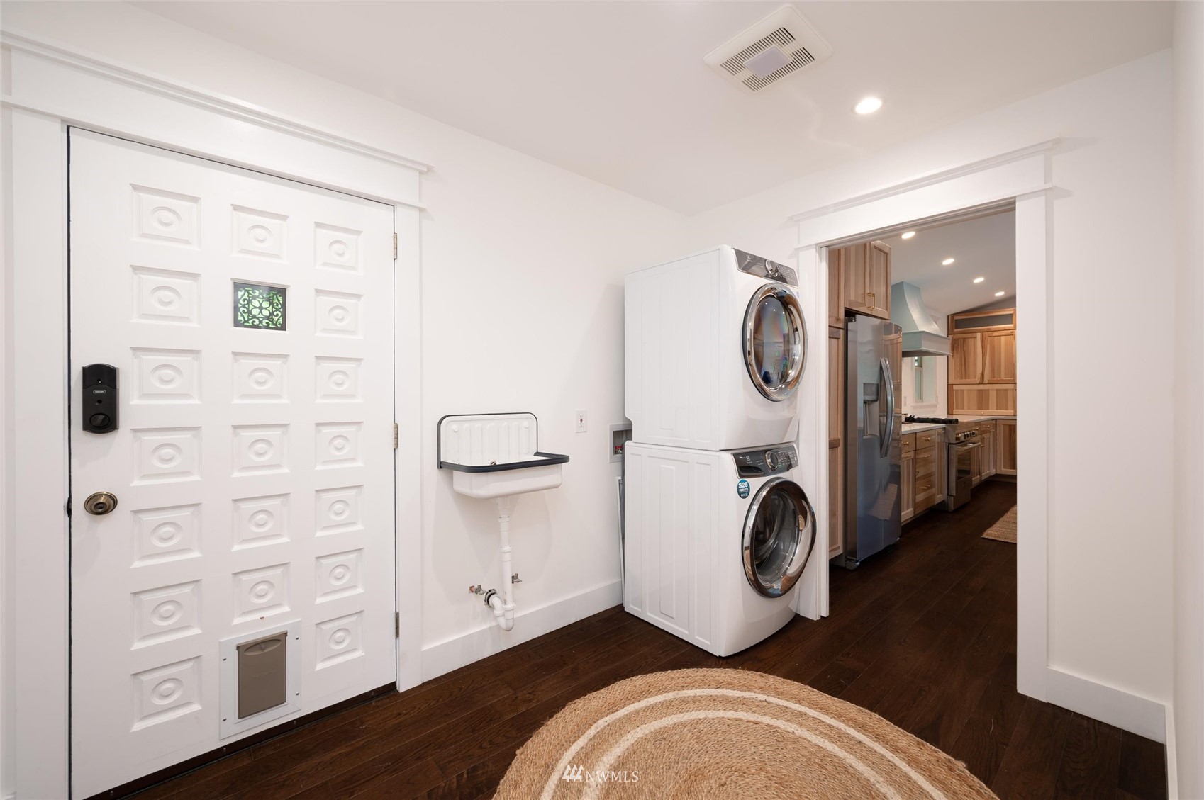 3373 Hillside Road Deming, WA 98244 - Photo 16 of 40 a view of a bedroom with washer and dryer
