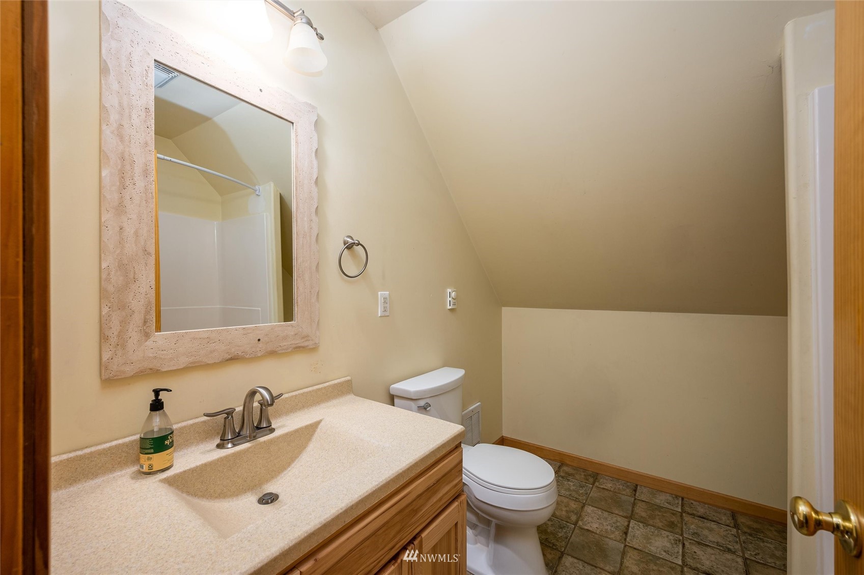 3373 Hillside Road Deming, WA 98244 - Photo 27 of 40 a bathroom with a sink and a mirror