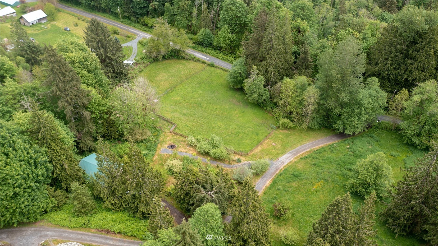 3373 Hillside Road Deming, WA 98244 - Photo 3 of 40 an aerial view of residential houses with outdoor space and trees