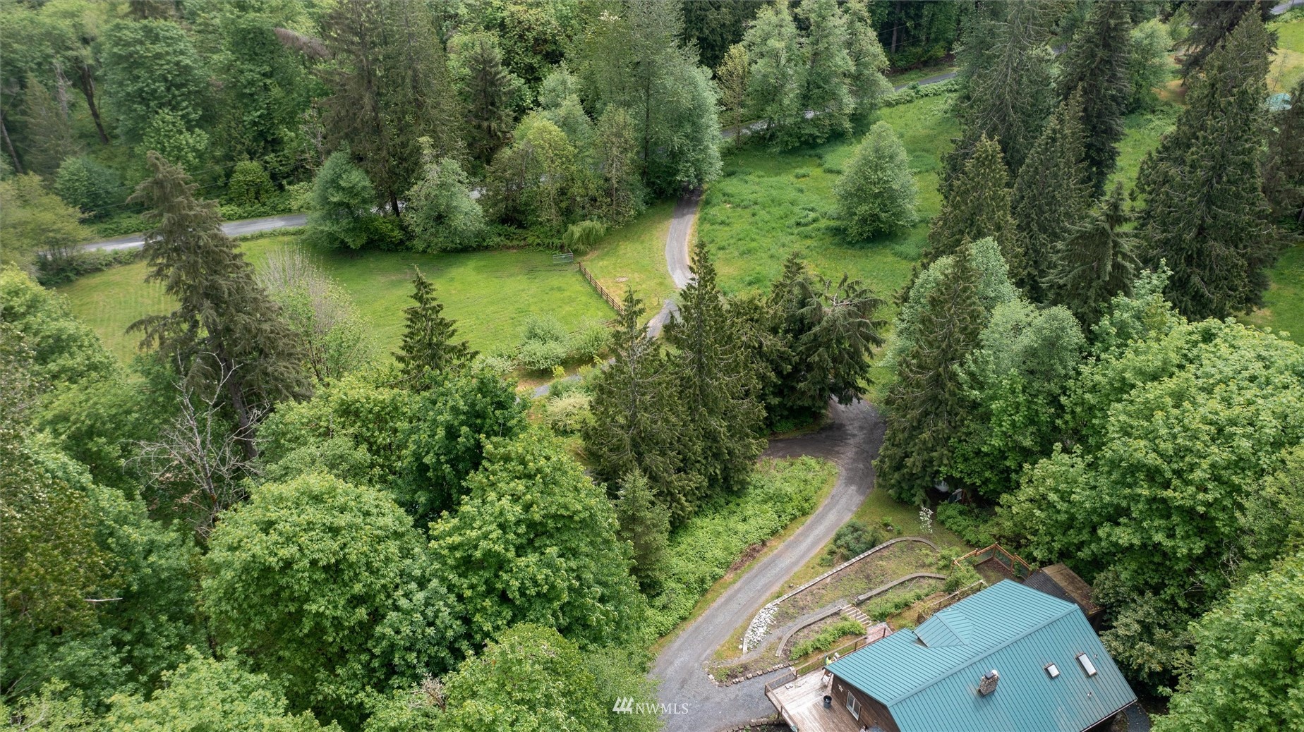 3373 Hillside Road Deming, WA 98244 - Photo 39 of 40 an aerial view of a house with a yard