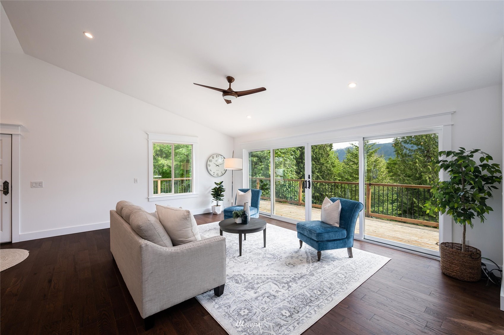 3373 Hillside Road Deming, WA 98244 - Photo 6 of 40 a living room with furniture and a large window