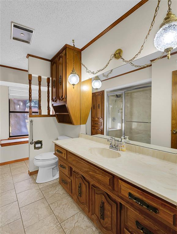 210 Chelsea Drive Hewitt, TX 76643 - Photo 23 of 36 a spacious bathroom with a double vanity sink and a mirror