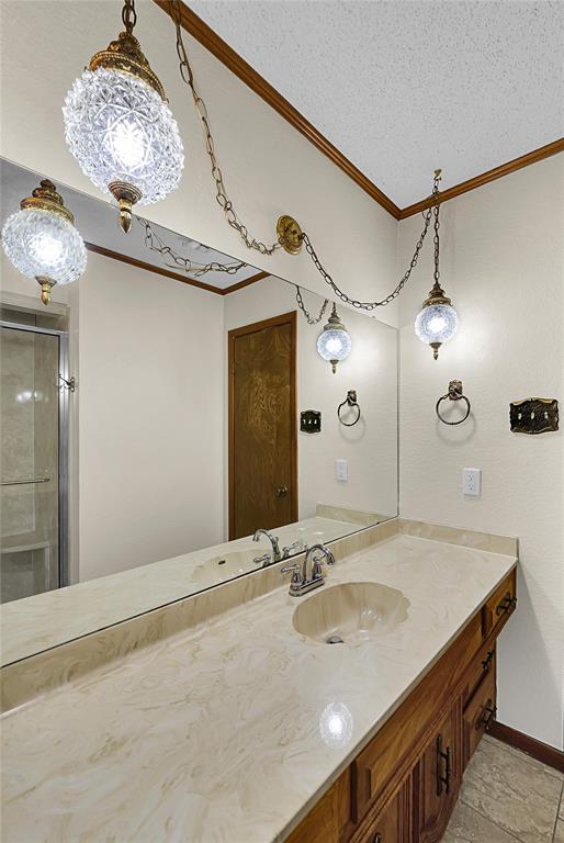 210 Chelsea Drive Hewitt, TX 76643 - Photo 24 of 36 a bathroom with a sink double vanity and a mirror