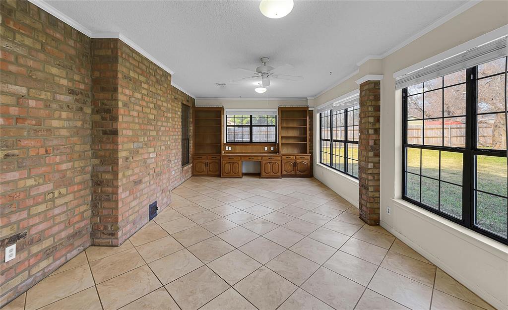 210 Chelsea Drive Hewitt, TX 76643 - Photo 27 of 36 a large space with a large window and kitchen view