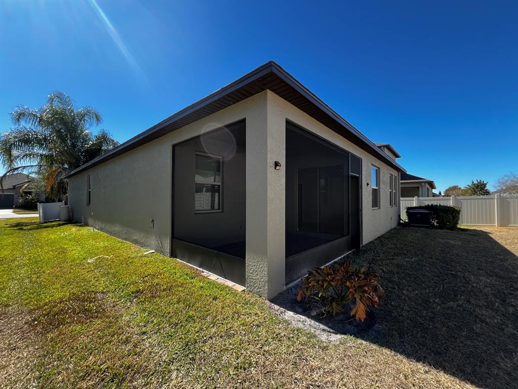25195 Lambrusco Loop Lutz, FL 33559 - Photo 35 of 36 a view of backyard of house