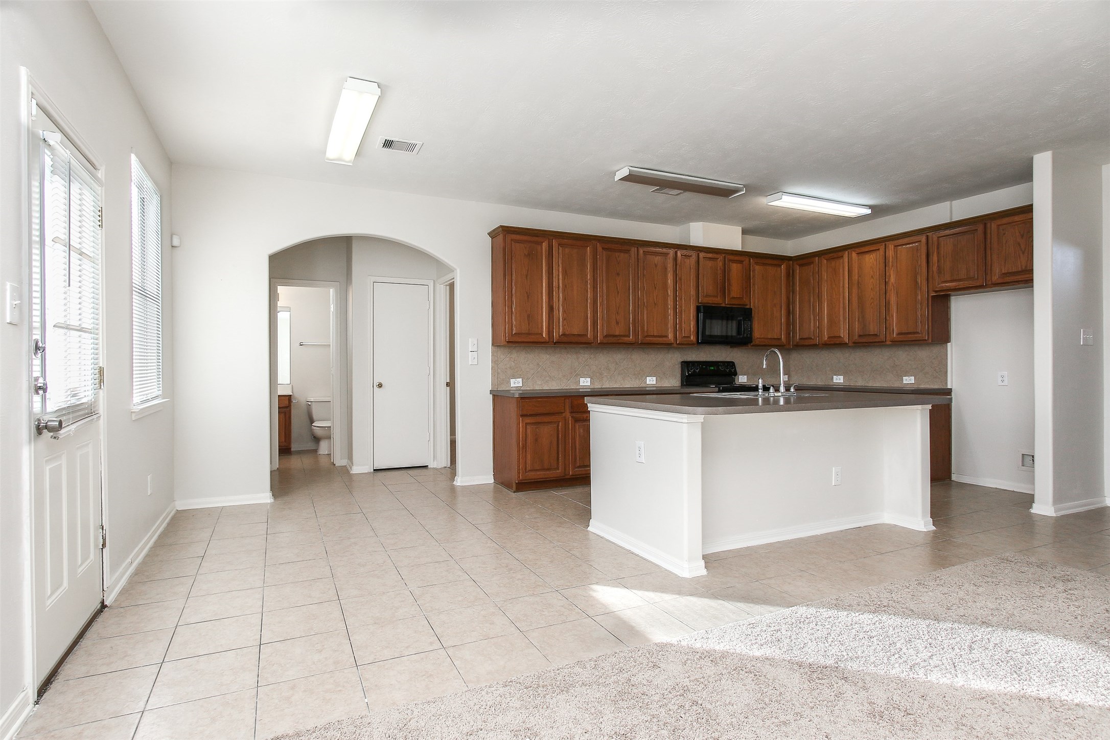 6103 Menor Crest Drive Spring, TX 77388 - Photo 11 of 41 There's a seating area at the island