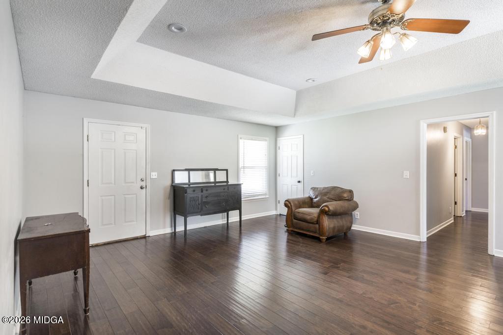 3710 Sandy Circle Macon, GA 31216 - Photo 7 of 44 a living room with furniture and a wooden floor
