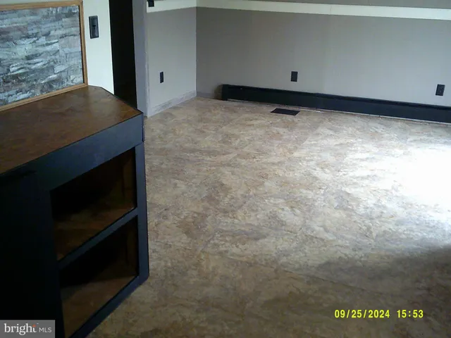 a living room with a fireplace