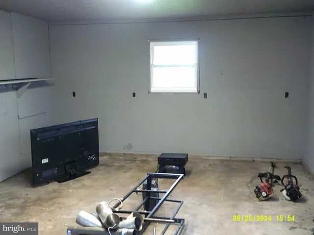 a room with furniture and window