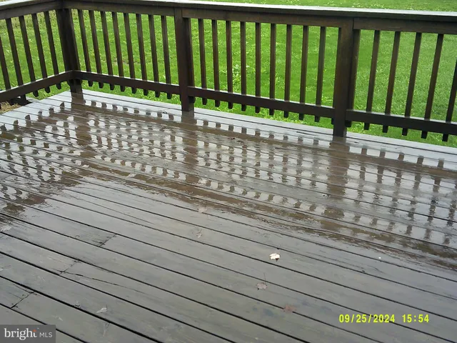 a view of a yard with an outdoor seating