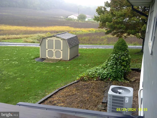 a view of an ocean and a mountain