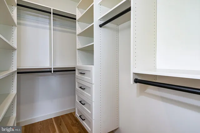 a view of an empty walk in closet