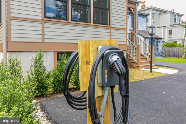 a view of swimming pool with a backyard and porch