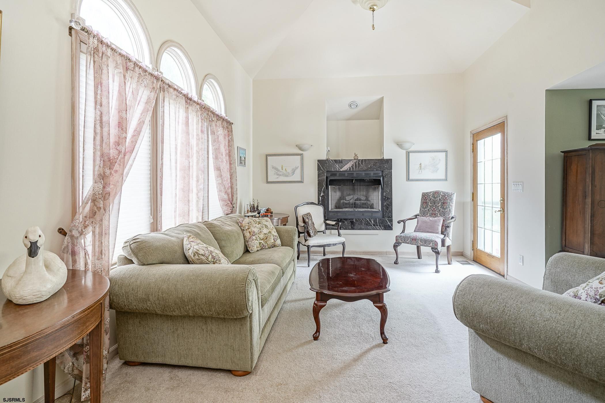 1099 Somers Point Road Egg Harbor Township, NJ 08234 - Photo 14 of 55 a living room with furniture and a large window