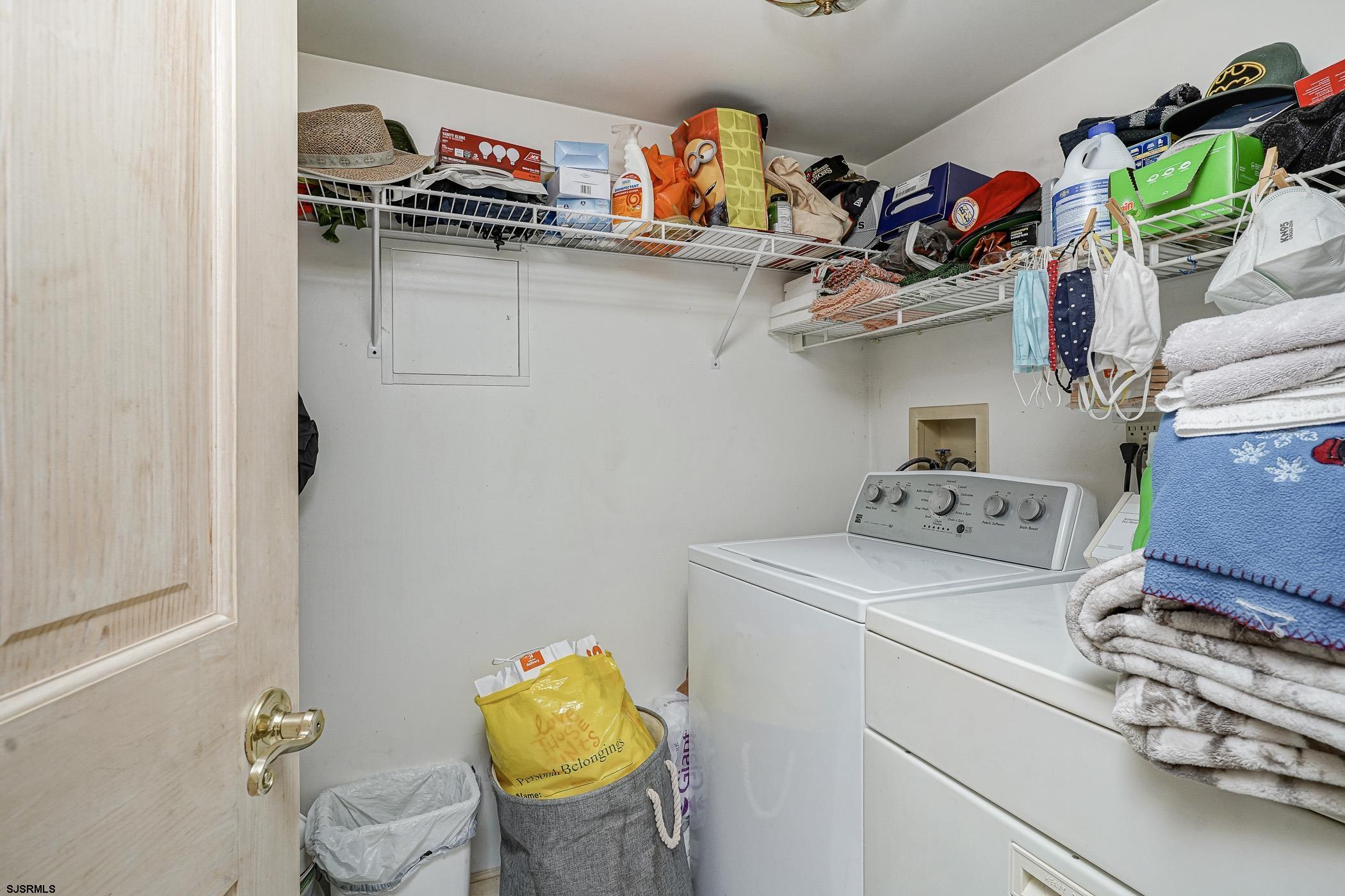1099 Somers Point Road Egg Harbor Township, NJ 08234 - Photo 28 of 55 a utility room with dryer washer and shoe rack