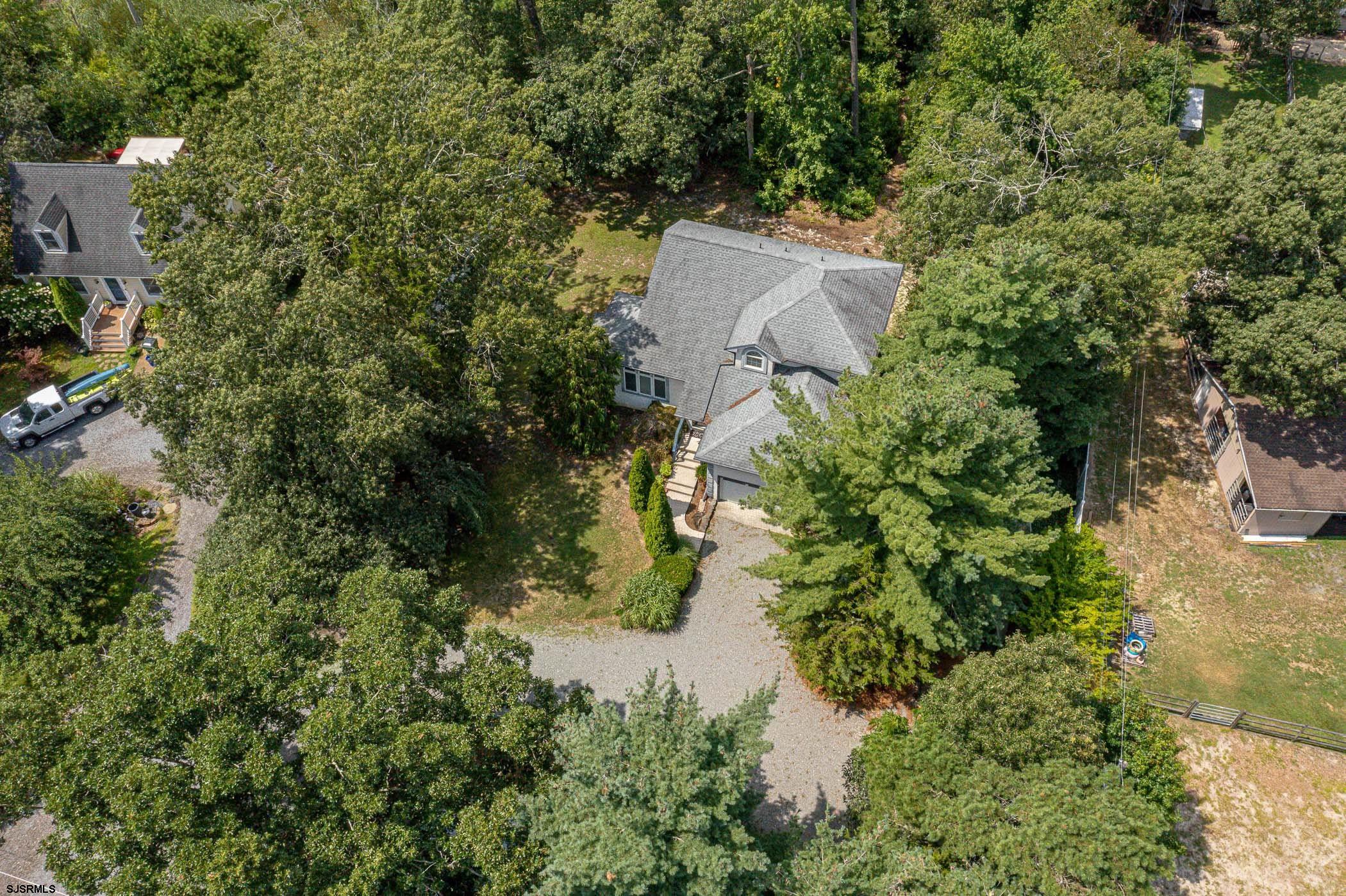 1099 Somers Point Road Egg Harbor Township, NJ 08234 - Photo 37 of 55 an aerial view of a house with pool and garden