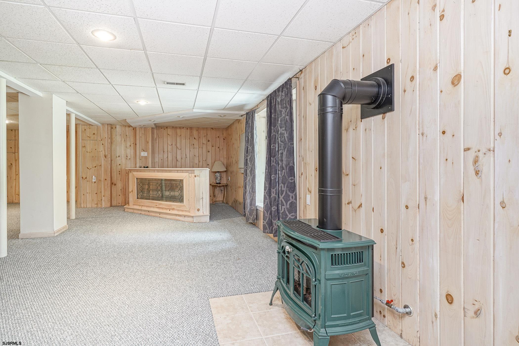 1099 Somers Point Road Egg Harbor Township, NJ 08234 - Photo 4 of 55 Daylight walk out basement - wood burning stove.