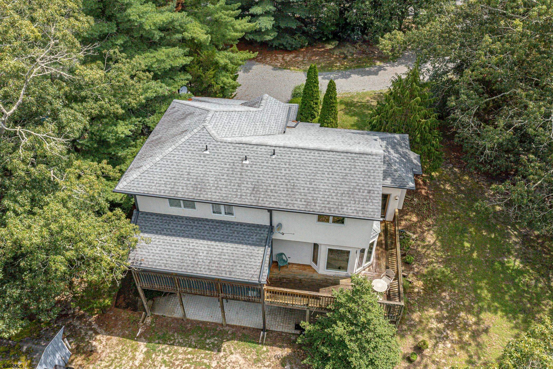 1099 Somers Point Road Egg Harbor Township, NJ 08234 - Photo 52 of 55 a aerial view of a house with a yard and balcony