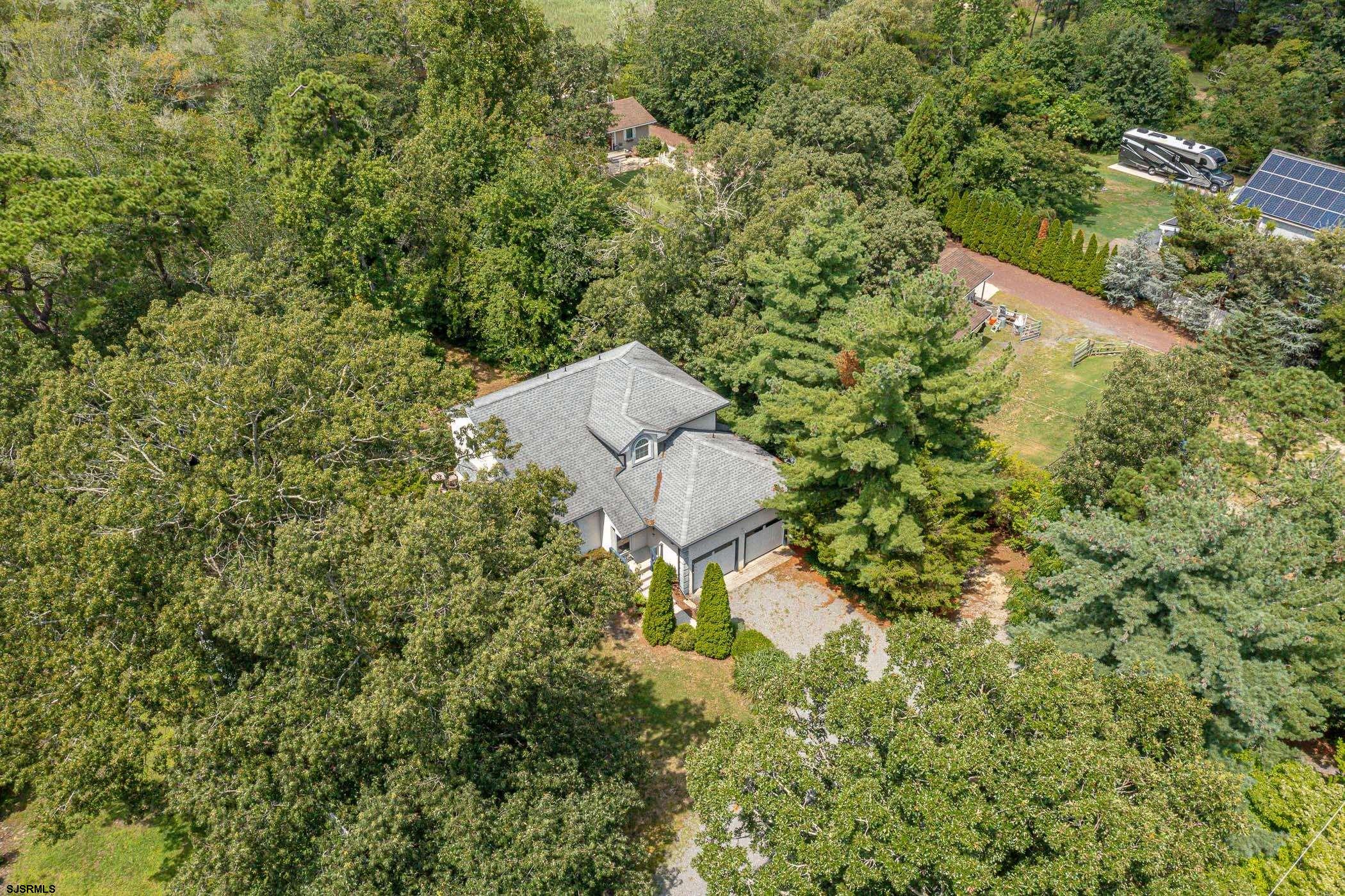 1099 Somers Point Road Egg Harbor Township, NJ 08234 - Photo 54 of 55 a backyard of a house with a yard and outdoor seating